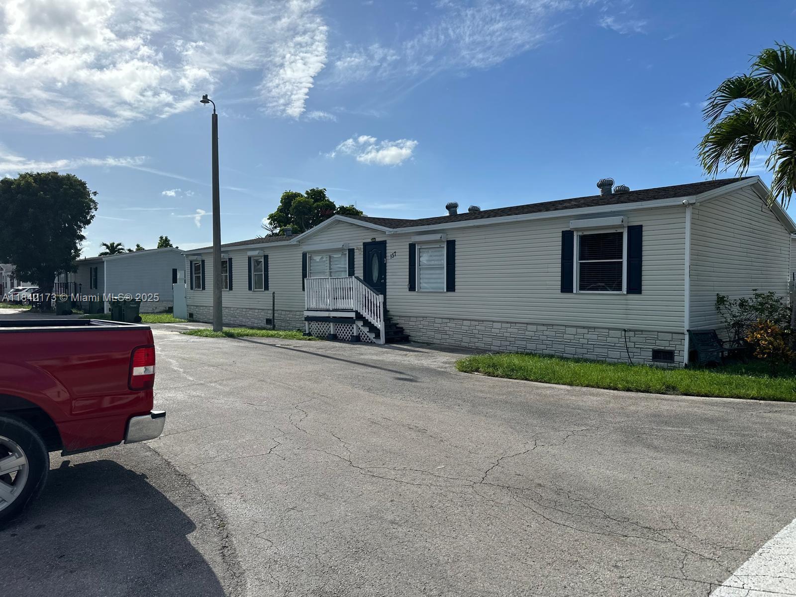 Welcome to this updated and spacious 2004 manufactured home with 4 bedrooms and 2 bathrooms, situated on a corner lot and fully fenced, measuring 5,020 sq. ft., located in Cocowalk Estates.
Easy to show.
Conveniently located near US1 & Turnpike.
A must-see, Low HOA fee of only $161.00!
