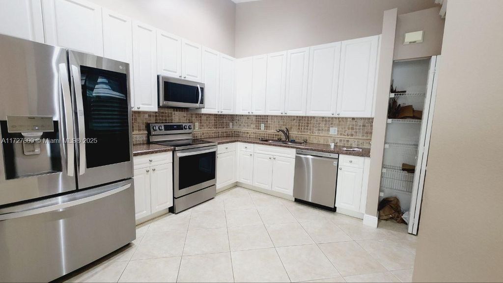 Photo of 8634 Lineyard Cay #n/a, West Palm Beach, FL 33411 (MLS # A11727800)