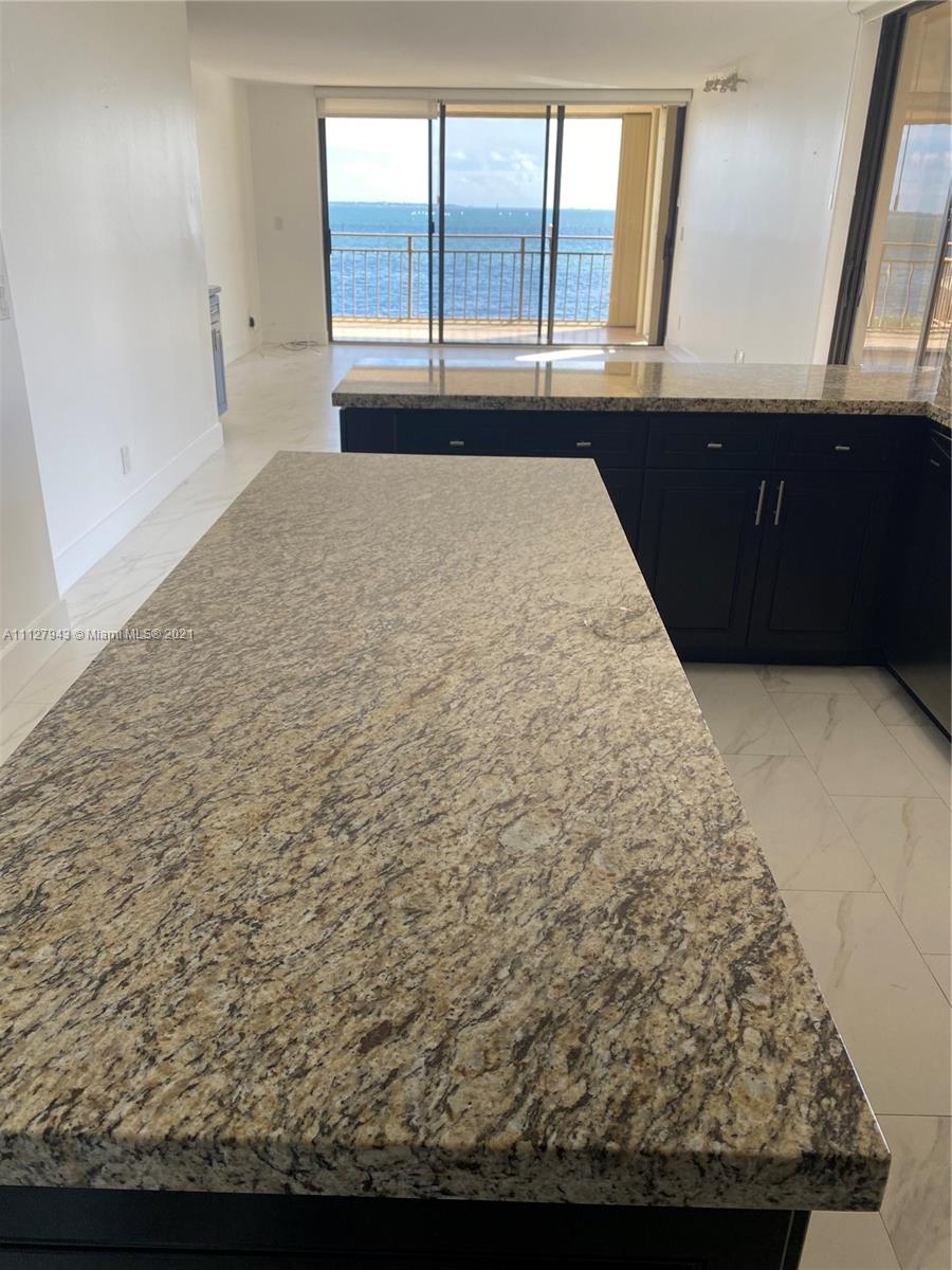MAGNIFICENT OCEAN FRONT CORNER UNIT! WITH MULTIPLE OCEAN VIEWS AND TWO AMPLE BALCONIES. TASTEFULLY REMODELED. At the Pelican Reef Condo. Open Ocean views from the moment you walk in, into the kitchen, dinning room, living room and Master bedroom. All with open and unobstructed ocean views. Electronic shades all around the property. Balcony right of the kitchen and dinning area. Another spacious balcony off the living room and master bedroom!This boutique condo building is in the heart of Coconut Grove. Very close to Mercy Hospital.