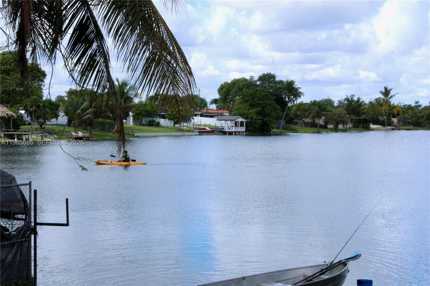 Beautiful two-story lakefront home located in a highly desirable area. This spacious property offers over 3,000 sq ft of living space under A/C and features a flexible layout with two separate entrances, making it ideal for extended family living or potential income opportunities. The home offers generous living areas, great natural light, and beautiful lake views that create a peaceful and relaxing atmosphere. Located in a prime neighborhood close to major highways, shopping, restaurants, and schools. A rare opportunity to own a large lakefront property with endless possibilities.