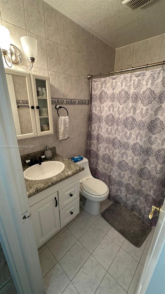 TENNIS VIEW CONDO PH I - Residential Lease