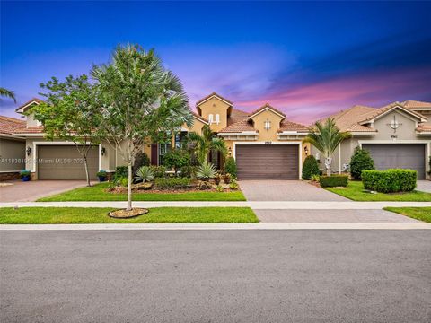 Photo of 9549 W Kalmar Circle, Parkland, FL 33076 (MLS # A11838195)