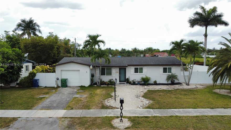 Well Maintained 2 bedrooms, 2 bathrooms (3/2 originally) home with 1-car garage with large backyard in a quiet & family oriented neighborhood in Homestead! This charming home features: Landscaped front yard with impact door & windows, ceramic tile & wood floors thru-out, living & dining area, nice kitchen with snack counter, very spacious primary room with en-suite bathroom, family room, patio overlooking the large privacy fenced backyard with enough room to park an RV or boat! New Water Filtration System! Excellent location, close to US-1, Florida Keys, Redlands, Shopping Centers & more!! Excellent for 1st Time home buyers!! Easy to Show by Appointment!!