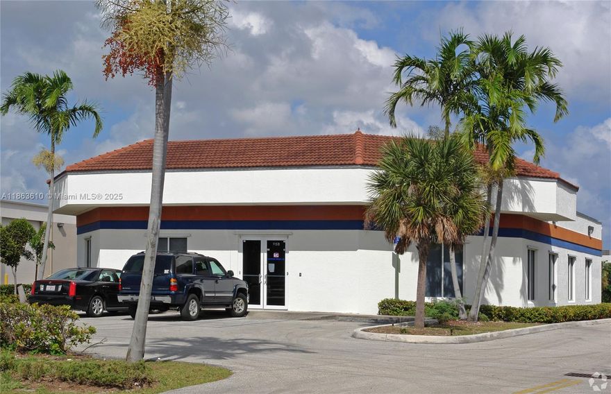 One of a kind! Name your building!    Rare, free standing office building in the middle of the fast growing Pompano Beach industrial /commercial core.      Ample parking.  30,000 sf lot.   
Perfect for professional, sales, contractor and many other uses.    
9 offices, 1 large conference room, eat-in kitchen, 20 parking spaces, room for 18 wheel trucks.
Zoned I-1, Pompano Beach