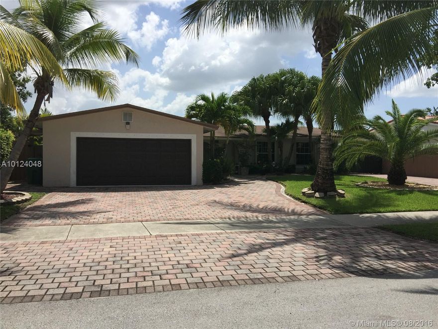 Beautiful Home.  Ready to Move In. 3/2 with In-Law quarters. Total custom updates. Tile through-out. Custom lighting through-out. Custom updated kitchen with Stainless steel appliances, large gas stove and wine refrigerator.  Laundry Room. Large Master Bedroom. Updated Bathrooms. Large covered patio. Large Storage Shed. Mango tree. Beautiful landscaping. Covered parking and extra area on side of house. Plenty of parking in front. Generator Hook Up. In Winston Park with clubhouse and pool amenities.