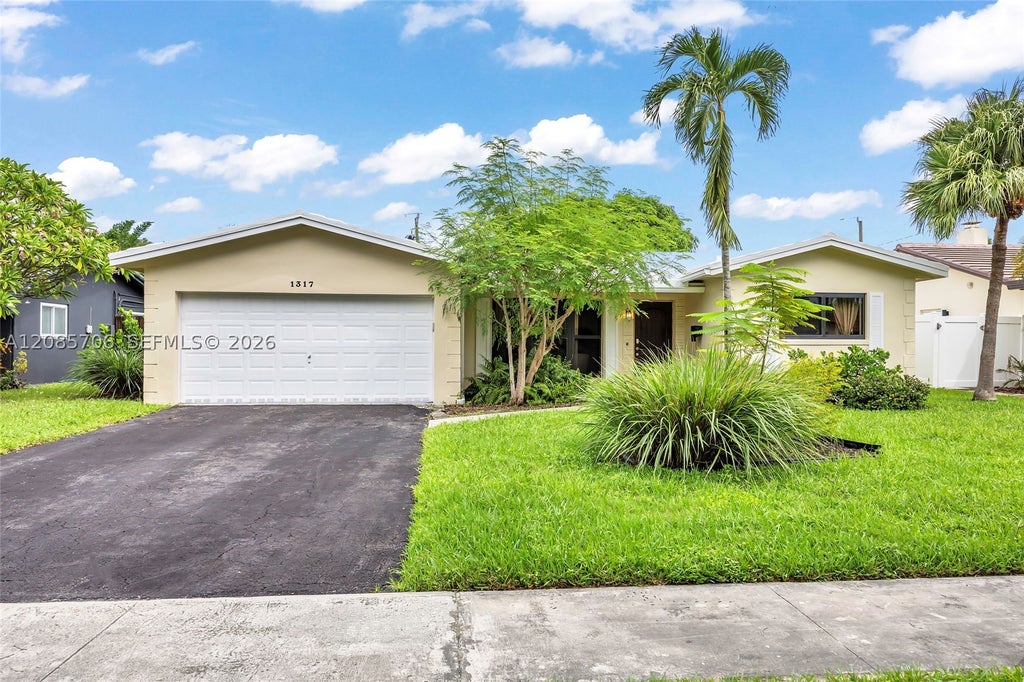 Photo of 1317 Funston St, Hollywood, FL 33019 (MLS # A12085706)
