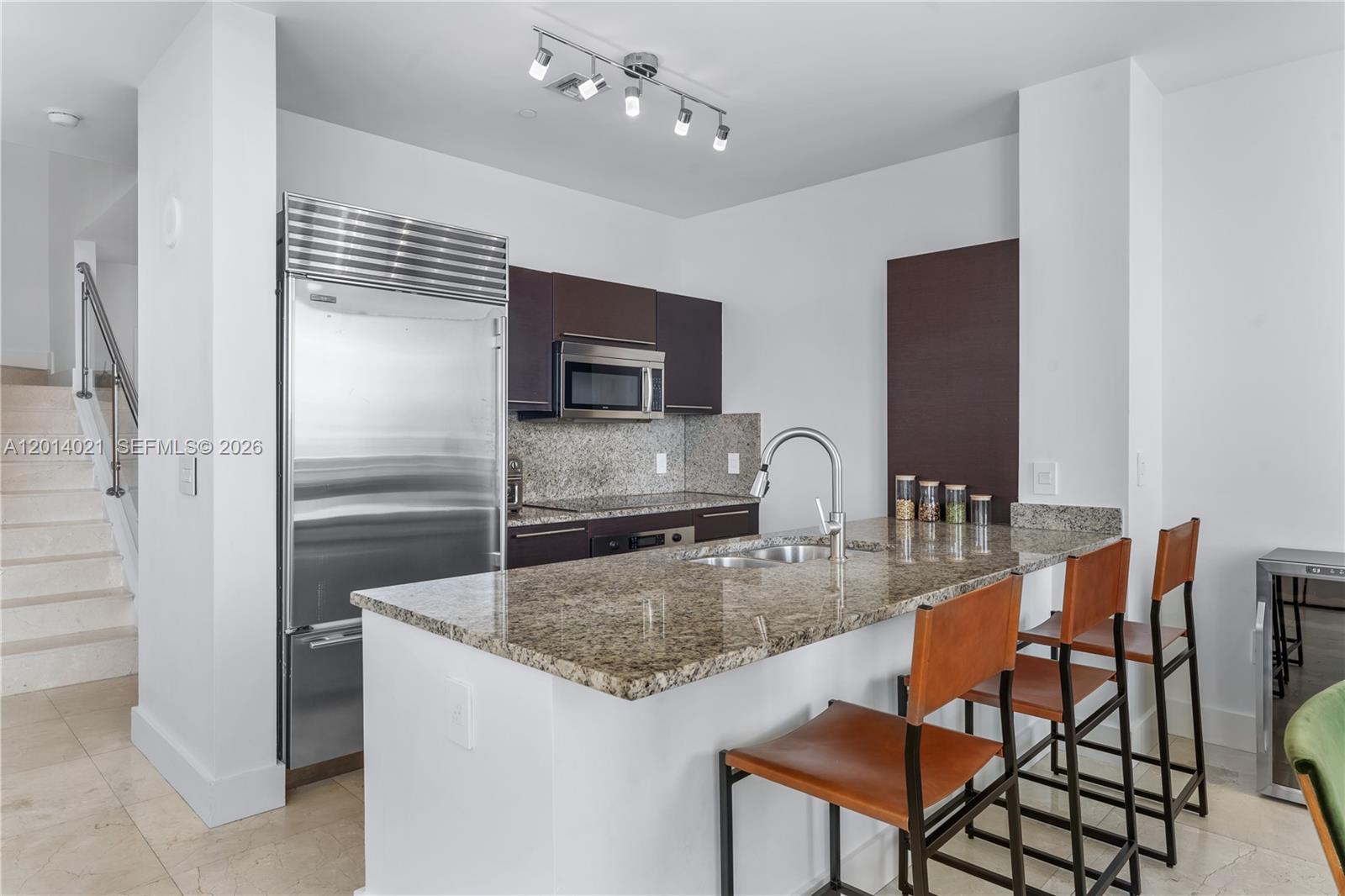 THE PLAZA 851 BRICKELL CO - Residential Lease