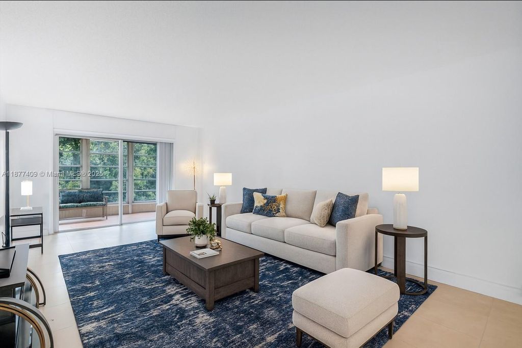 Photo of 2401 Antigua Cir #A3, Coconut Creek, FL 33066 (MLS # A11877409)