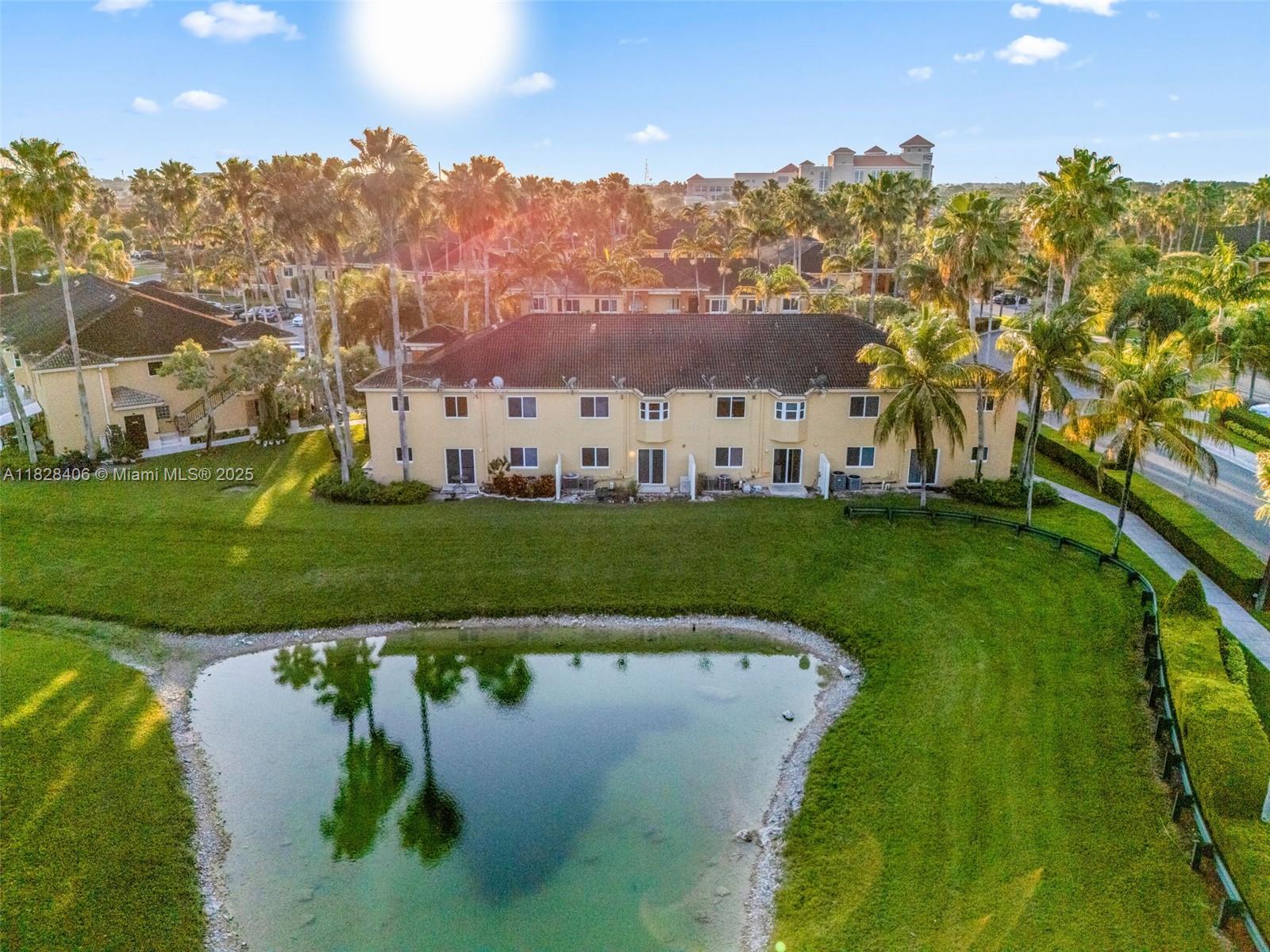 Welcome to this spacious 2-bedroom, 2-bathroom condo townhouse in Monterey at Malibu Bay! Conveniently located near the Turnpike and just a short drive to the Florida Keys, this home offers easy access to shopping, top-rated schools, beaches, and entertainment. Inside, enjoy a bright living space with unique pond views, a large master bedroom featuring a walk-in closet, and recent updates that include a new air conditioning unit and alarm system. An outdoor storage unit adds convenience. The community features a pool, fitness center, clubhouse, and 24-hour security. A great investment opportunity that also offers comfort, security, and a connected lifestyle! Monthly fees: Master HOA $77, Condo $284.50. Special Assessment of $191.55 per month until May 2027.