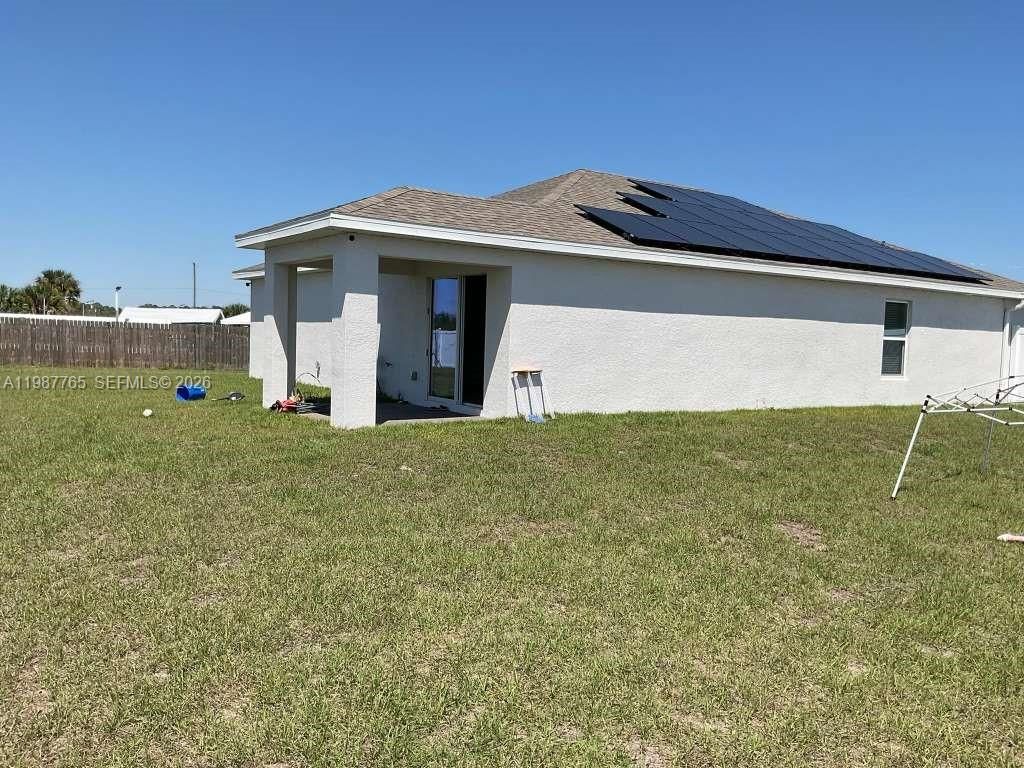 Photo of 9013 Meadow Cir, La Belle, FL 33935 (MLS # A11987765)