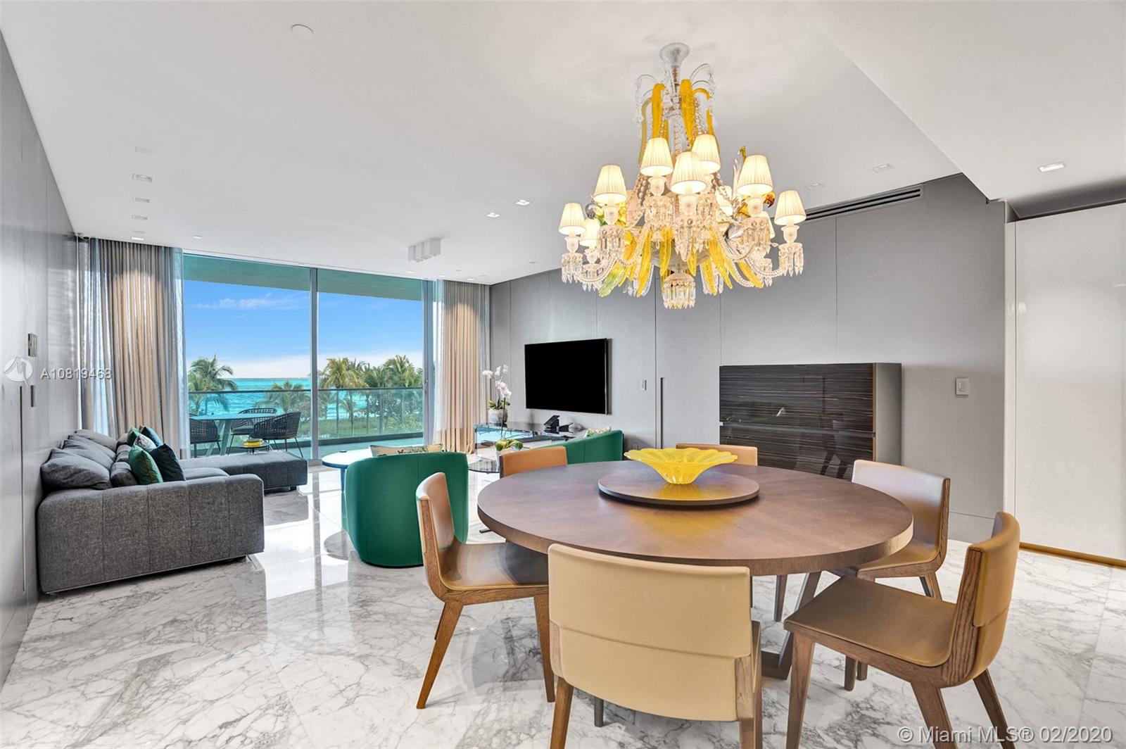 Enjoy Atlantic Ocean vistas and tropical breezes from this Oceana Bal Harbour 2 bedroom plus den smart home residence. This home was finished with the upmost exquisite and high-end finishes including Calacatta gold marble flooring throughout, Onyx baths and complete automation by Creston just to name a few. Absolutely no expenses have been spared! Den can be used as bedroom with en-suite bath. Full service building includes an array of resort-like amenities, five-start restaurant and white sandy beach with turquoise water just an elevator ride away. This is truly the best of the best in Bal Harbour!