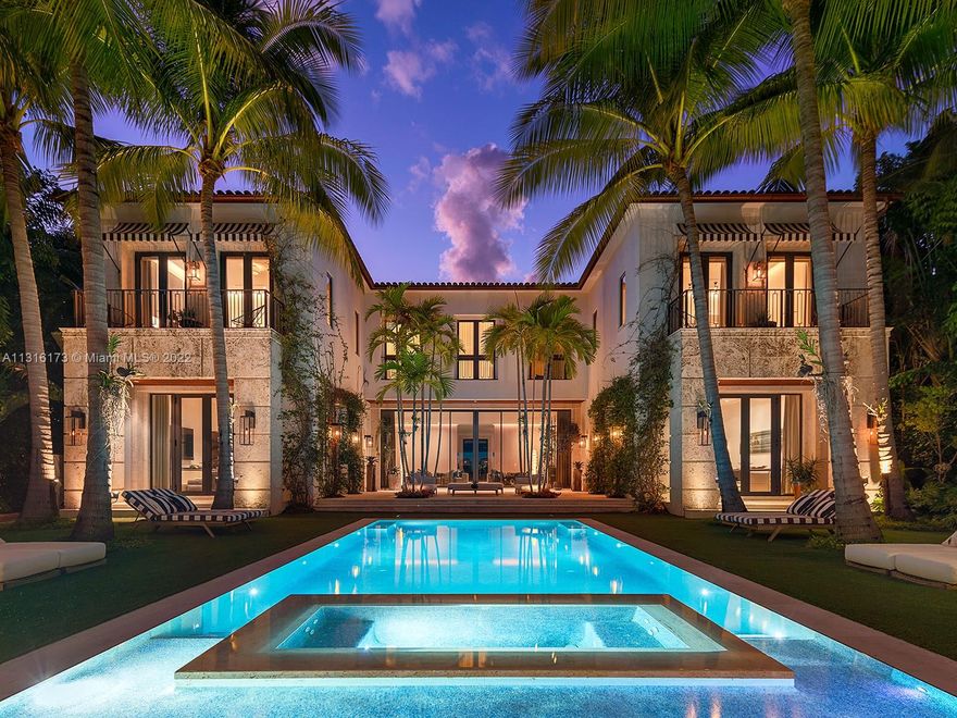 This magnificent newly constructed Mizner-inspired villa was tastefully designed as a contemporary redux with an unprecedented level of detail influenced by owner-developer, Oren Alexander. Enter the gated porte-cochère through the coach house featuring a staff quarters & an A/C 2-car garage. The main house features an elegant mixture of travertine flooring, walls adorned with oak, and stones. 30ft. wide living room with tuckaway sliding doors creating a seamless indoor-outdoor living. Elegant formal dining, show kitchen, chef's kitchen, bar with a floating fireplace, media room, and an office make up the 1st floor. The primary suite has a sitting area w/ a bar, and one of grandest bathrooms ever seen. Beyond the overflowing perimeter pool lies the Gazebo with a Gym, BBQ area & Guest Suite
