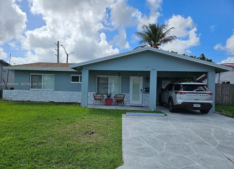 Photo of 4613 NW 30th Ter, Tamarac, FL 33309 (MLS # A11980435)