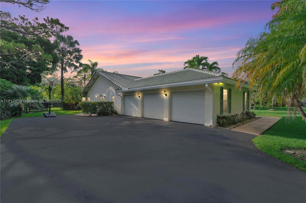 Photo of 5942 NW 71st Ter, Parkland, FL 33067 (MLS # A11817450)