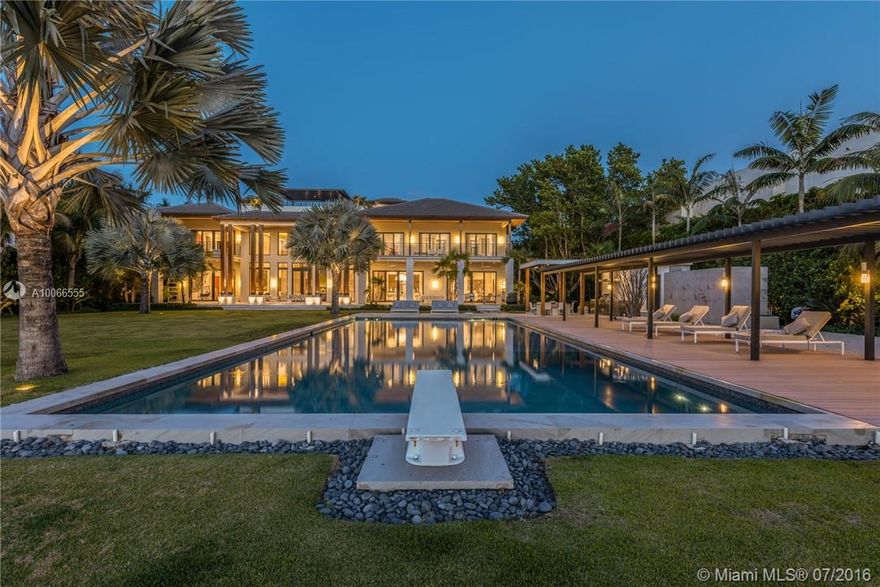 This awe inspiring waterfront estate (164 ft of water frontage) on prestigious N Bay Road, newly created in a tropical modern design. This over an acre (48,875 sq ft) paradise w/meticulously landscaped gardens, enormous covered patios and rooftop terrace, a stunning swimming pool flanked by palms and the wide bay offering total privacy within its amenity rich compound. Attention to details include elevator, 3 car garage, wine cellar, gym. Prime location with great walking score.