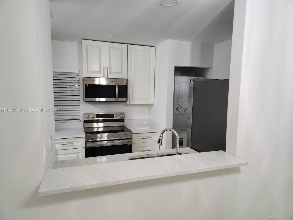 New floors, baseboards, baths, kitchen, appliances, lights, paint and ceilings. All offers need proof of funds. Loan offers accepted. Inspection period limited to 5 calendar days. Must coordinate with listing agent to view property and front gate access. HOA fee $380 includes water, garbage, landscaping, security, courtyard cleaning, pool. New roof, plaster walls, exterior paint, fence completed 2022. Patio door and all widows are new upgraded high impact hurricane windows. Buyer must apply to HOA and be approved. Former pending contract/buyer was not approved.