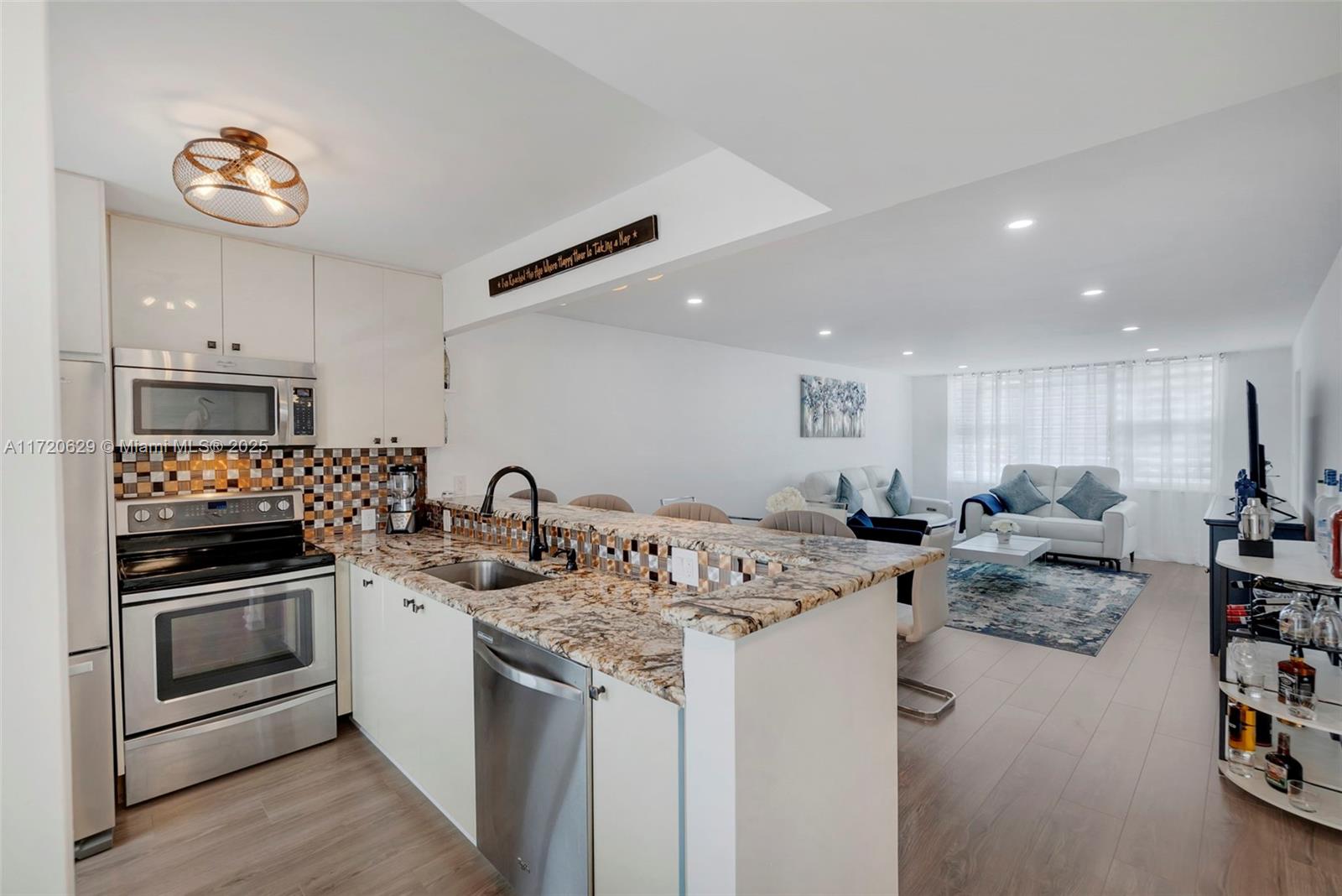 ONE-MINUTE WALK TO THE BEACH AND POMPANO'S NEW PIER AND ENTERTAINMENT AREA. TASTEFULY COMPLETELY RENOVATED CONDO! WINDOWS, WINDOWS, AND MORE WINDOWS - ALL IMPACT. THIS TWO-BEDROOM, TWO-BATHROOM WITH LOTS OF CLOSET SPACE HAS AN OVERSIZED BALCONY WITH A BEAUTIFUL VIEW OF THE POOL AREA FACING DIRECTLY EAST TO THE OCEAN. FEELS LIKE A TOWNHOUSE AS YOU DRIVE UP DIRECTLY TO THE UNIT FROM RIVERSIDE - ON THE GARDEN FLOOR WITH COVERED PARKING CLOSE BY THE FRONT DOOR. DO NOT MISS OUT ON THIS! MOVE IN OR RENT AFTER TWO YEARS - GREAT FOREVER HOME OR INVESTMENT.