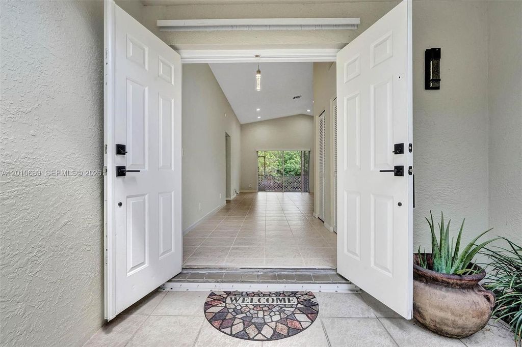 Photo of 10219 NW 48th Mnr, Coral Springs, FL 33076 (MLS # A12010689)
