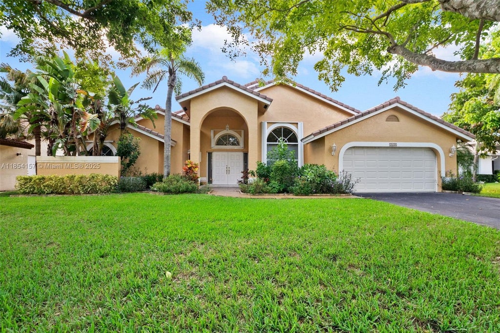 Photo of 4635 NW 99th Ln, Coral Springs, FL 33076 (MLS # A11854157)
