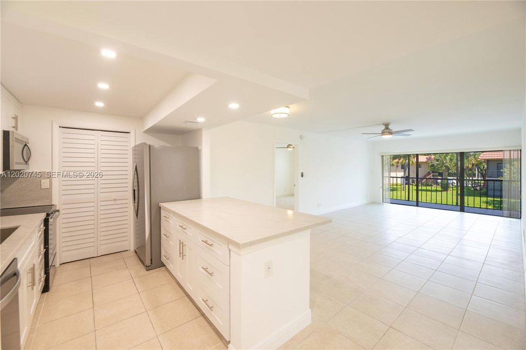 Photo of 200 Lakeview Dr #211, Weston, FL 33326 (MLS # A12020745)