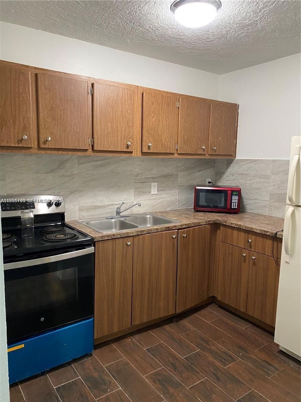 Photo of 3020 NW 2nd St, Pompano Beach, FL 33069 (MLS # A11951700)