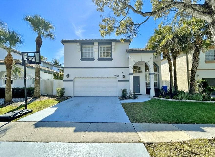 Located in the highly desirable community  of Classic Vista in Towngate, this spacious two-story home offers comfort, functionality, and an ideal location. The home features both formal and casual living areas, providing flexibility for entertaining and everyday living. The huge master suite includes a soaking tub and walk-in closet, creating a private retreat. A separate laundry room adds everyday convenience. Step outside to a large backyard perfect for entertaining, gardening, or simply enjoying the outdoors. Conveniently located near great shopping and dining, with easy access to I-75, this home blends lifestyle and accessibility in one of Pembroke Pines most sought-after neighborhoods. HOA ALSO PAINTS THE  EXTERIOR OF THE PROPERTY EVERY 3–5 YEARS. Easy to show