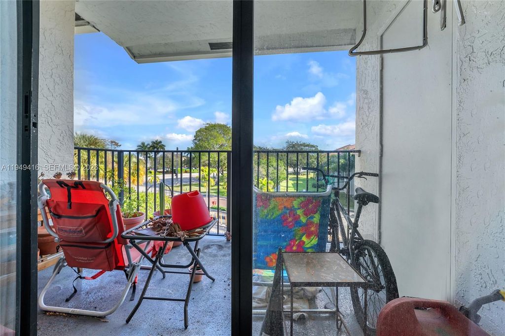 Photo of 9266 W Atlantic Blvd #1038, Coral Springs, FL 33071 (MLS # A11949416)