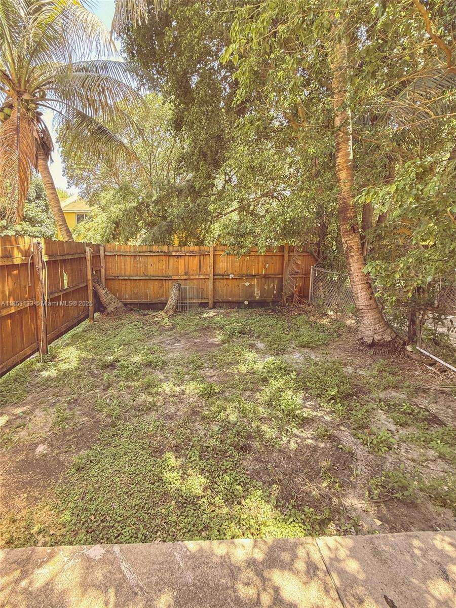 Beautiful and spacious 3-bedroom, 2.5-bath townhouse located in a quiet and well-kept area of Opa-locka. This two-story home features a bright open living space, modern kitchen, and generously sized bedrooms. The primary suite includes a private bathroom, and there's a convenient half bath for guests. Enjoy your own private patio, ideal for outdoor dining or relaxing. Pet-friendly, with a fenced outdoor area perfect for your furry companions. Conveniently located near major highways, shopping, and public transportation. A perfect rental for families or professionals looking for comfort and privacy in a peaceful setting.