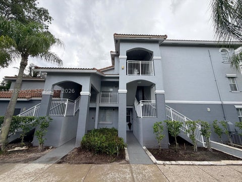Photo of 9645 NW 1st Ct #1-110, Pembroke Pines, FL 33024 (MLS # A12085502)