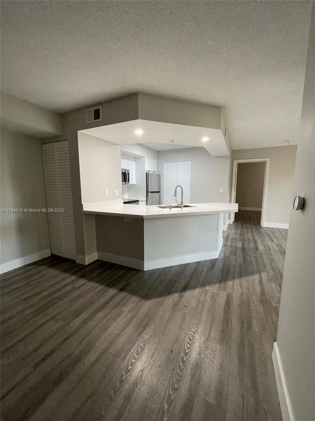 Photo of 3765 NW Mediterranean Ln #110, Jensen Beach, FL 34957 (MLS # A11384912)