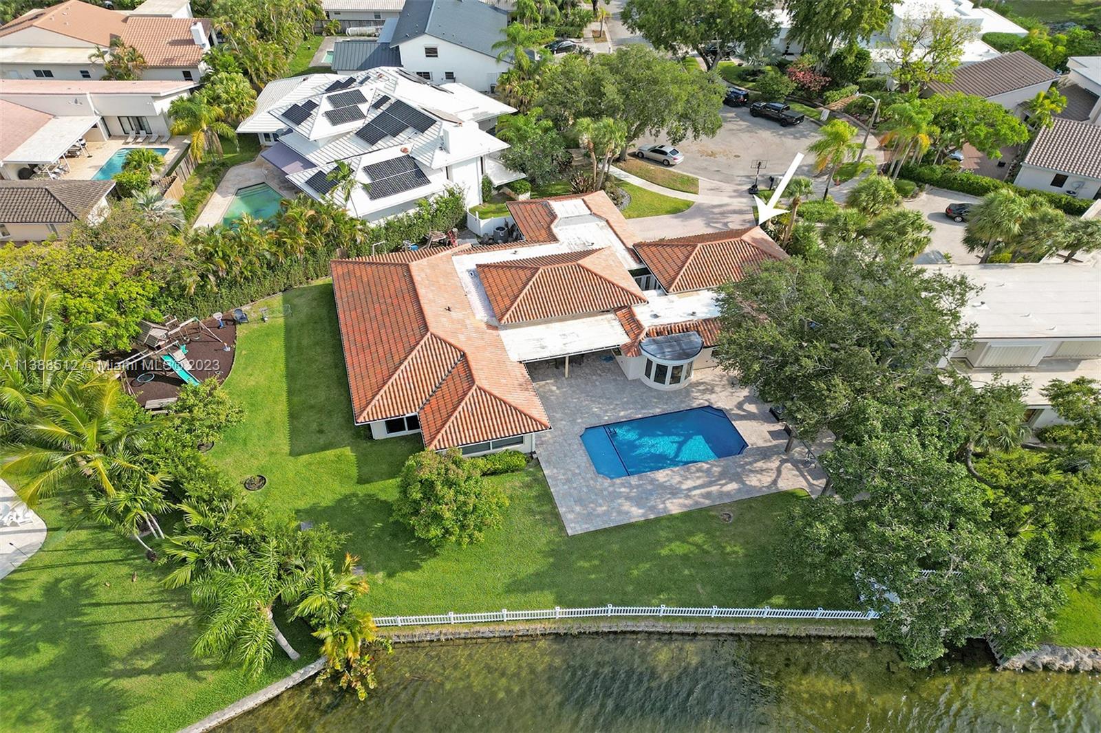 RARE OPPORTUNITY Best lakefront property in the prestigious & picturesque Lakes of Emerald Hills, a one story 4100sq ft oasis sprawled on 17,000sq ft of land, there is no shortage of space! 5 Bedrooms plus nanny/office room, 3 1/2 baths (incl Jack and Jill bath). Large Master Suite includes a deluxe bath, dressing area with a walk-in closet, and a bonus sitting area/office overlooking the lake. Large atrium that separates the living room and family room, high ceilings, wood & marble floors, lake views from every main room! Formal dining room leads to a gourmet kitchen & breakfast nook. Laundry room, double car A/C & insulated garage, heated/cooled pool, hurricane windows, large backyard playground and plenty of space! Located on a private cul de sac, this house is a dream!