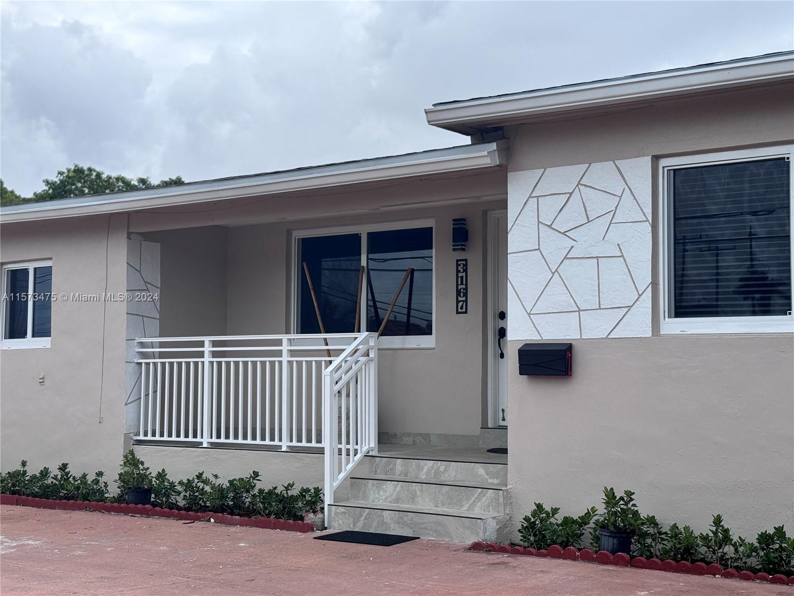 This meticulously renovated cozy 2-bedroom, 1-bathroom home features 1,652 square feet of comfort, a circular driveway. Recent upgrades include a new kitchen that features stainless steel appliances, custom cabinetry, and a large island—ideal for entertaining and casual meals. New HVAC system. Spacious living room with new floors throughout, newly installed large windows that fill the space with natural light. Large patio perfect for a family gathering. Property will have new entry gate installed. Close to restaurants, public transportation, minutes from downtown, Brickell and the beaches. Will not last!