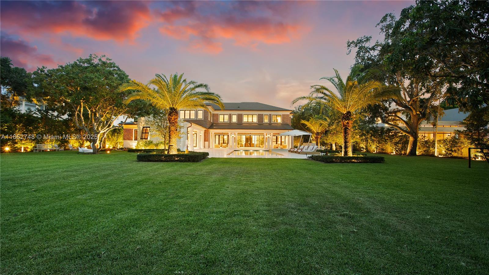 Welcome to an exceptional 9,878 Sq. Ft. newly constructed estate in sought-after North Pinecrest. This furnished Transitional Georgian home features 7 spacious bedrooms and 8.5 elegantly designed bathrooms. Blending classic style with modern amenities, the home showcases superior craftsmanship, custom millwork, hardwood floors, high ceilings, exquisite wallpapers, and rare marble walls. Perfect for entertaining, it includes a media room, gourmet kitchen, summer kitchen, and pool area. The chef's kitchen boasts a Bertazzoni range, Gaggenau fridge/freezer, and steam oven. Situated on a .89-acre lot, the outdoor oasis includes a summer kitchen, heated/cooled pool, jacuzzi, sauna, outdoor TV, whole-house generator, & gated security. Located near top schools, this unique estate is a rare find.