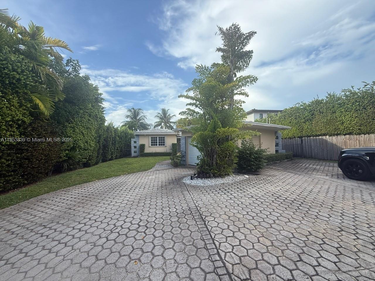 A rarely available rental home in the heart of Miami’s desirable Normandy Shores! 700 S Shore Drive is a 2 bedroom/2 bathroom single family home located on 60 feet of water in the backyard. This residence features an open-concept living area filled with natural light.
Step outside to a lushly landscaped backyard, ideal for entertaining or relaxing under the Florida sun. Enjoy private parking with an attached garage, a serene neighborhood just moments from world-class beaches, golf courses, shopping, dining, and top-rated schools. Located within the guard-gated Normandy Shores community, this home also provides access to exclusive amenities including tennis courts, a playground, and a waterfront park.
Available for immediate occupancy – schedule your private tour today!