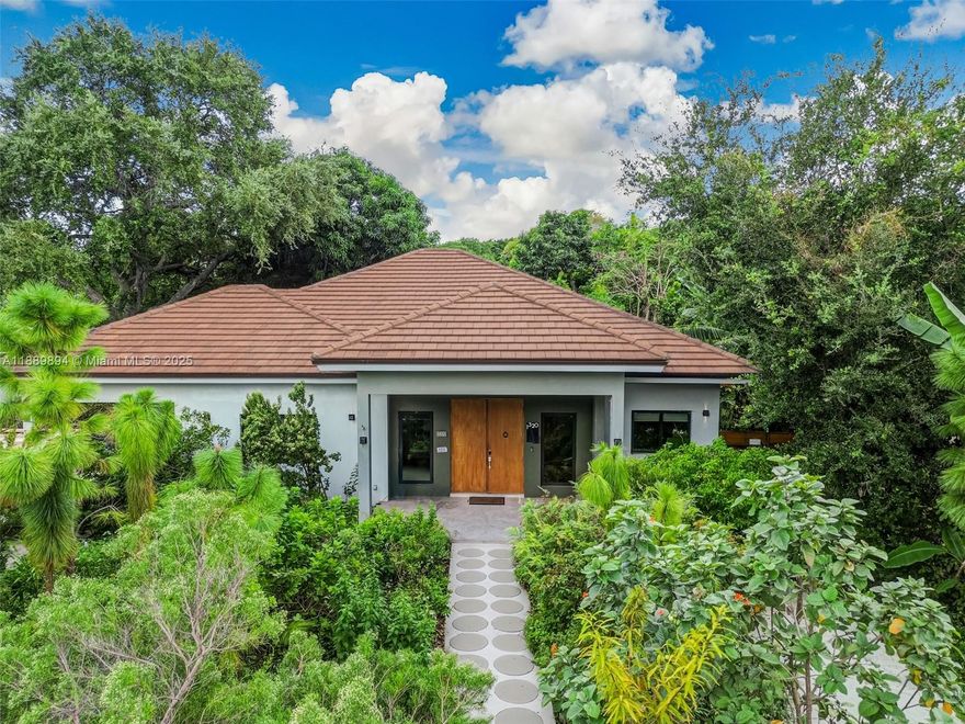OPEN SAT. A Modern Tropical Paradise in Quiet North Miami Neighborhood, Just 2 Blocks from Enchanted Forest. 2018 CONSTRUCTION. Soaring Ceilings, Natural Light, Flowing Spaces, a True SANCTUARY. Incredible Land, Native Landscape w Paths, Pond, Mature FruitTrees. Certified Butterfly/Pollinator Habitat! Perfect Kitchen w Oversized Island, Waterfall Quartz Countrs+Lux Appliances, Miele, KitchenAid, etc. PERFECT MASTER SUITE, 2 COVERED PATIOS. Detached CABANA HOUSE, Private Kitchen, So Nice For Inlaws/Office. Endless Features: FULL HURRICANE IMPACT GLASS, Newer ACs '24, Solar Panels, Smart Tech, NO SEPTIC + NONFLOOD ZONE, Well Irrigation, Landscape Lighting. ROOM FOR POOL. Just a DREAM. A+ Location: Best Restaurants, Costco, 10 Mins to Surfside Beach, 12 To Oleta, 16 to MIA Airport. Call Today