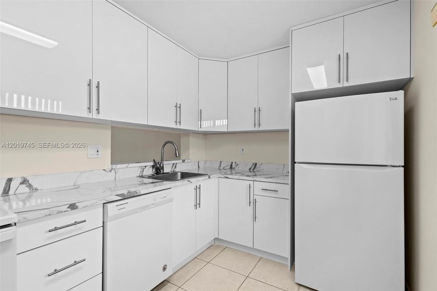 Spacious 2-bedroom, 2-bath condo located in the gated community of Horizons West! This well-maintained unit features an updated kitchen, tile floors throughout, and generously sized bedrooms. The primary suite offers direct balcony access, a walk-in closet, and an en-suite bath with a walk-in shower. Enjoy relaxing mornings or evenings on the large screened-in balcony with plenty of space for outdoor seating. Perfect for both homeowners and investors, this condo is located in a highly desirable and easy-to-rent community in the heart of Kendall. Residents enjoy resort-style amenities including 4 swimming pools, tiki hut areas, tennis courts, racquetball courts, playgrounds, clubhouse, and beautifully maintained grounds. Conveniently located near shopping, dining, major highways, and top-rated schools. Great opportunity to live in or add to your investment portfolio!