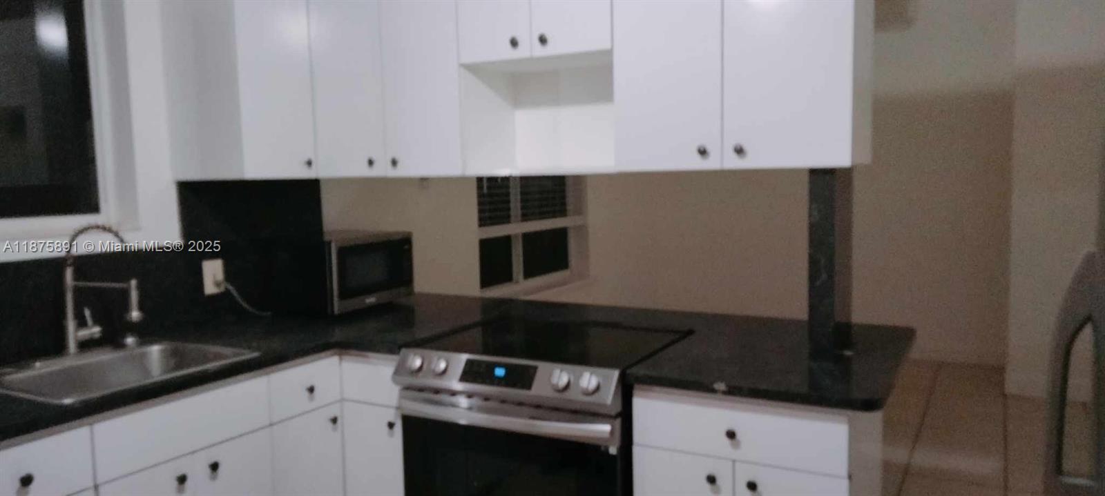 One bedroom, one bathroom unit within a duplex with two parking spaces. Separate electric meter. The water is included in the rent, and the electricity is paid by the tenants. The unit has the necessary hookups and connections for a washer & dryer, should tenants decide to install them at their own expense.