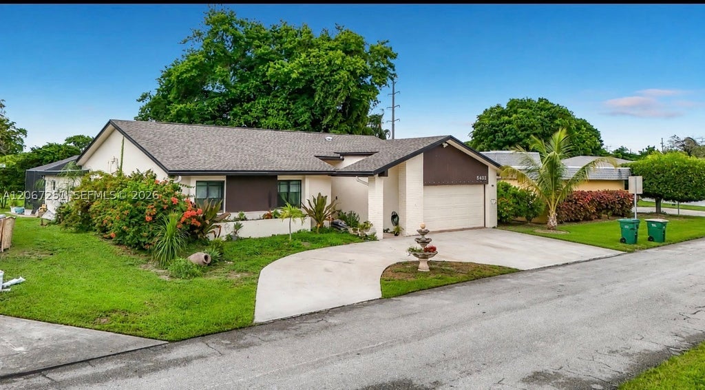 Photo of 5403 Bayberry Ln, Tamarac, FL 33319 (MLS # A12067251)