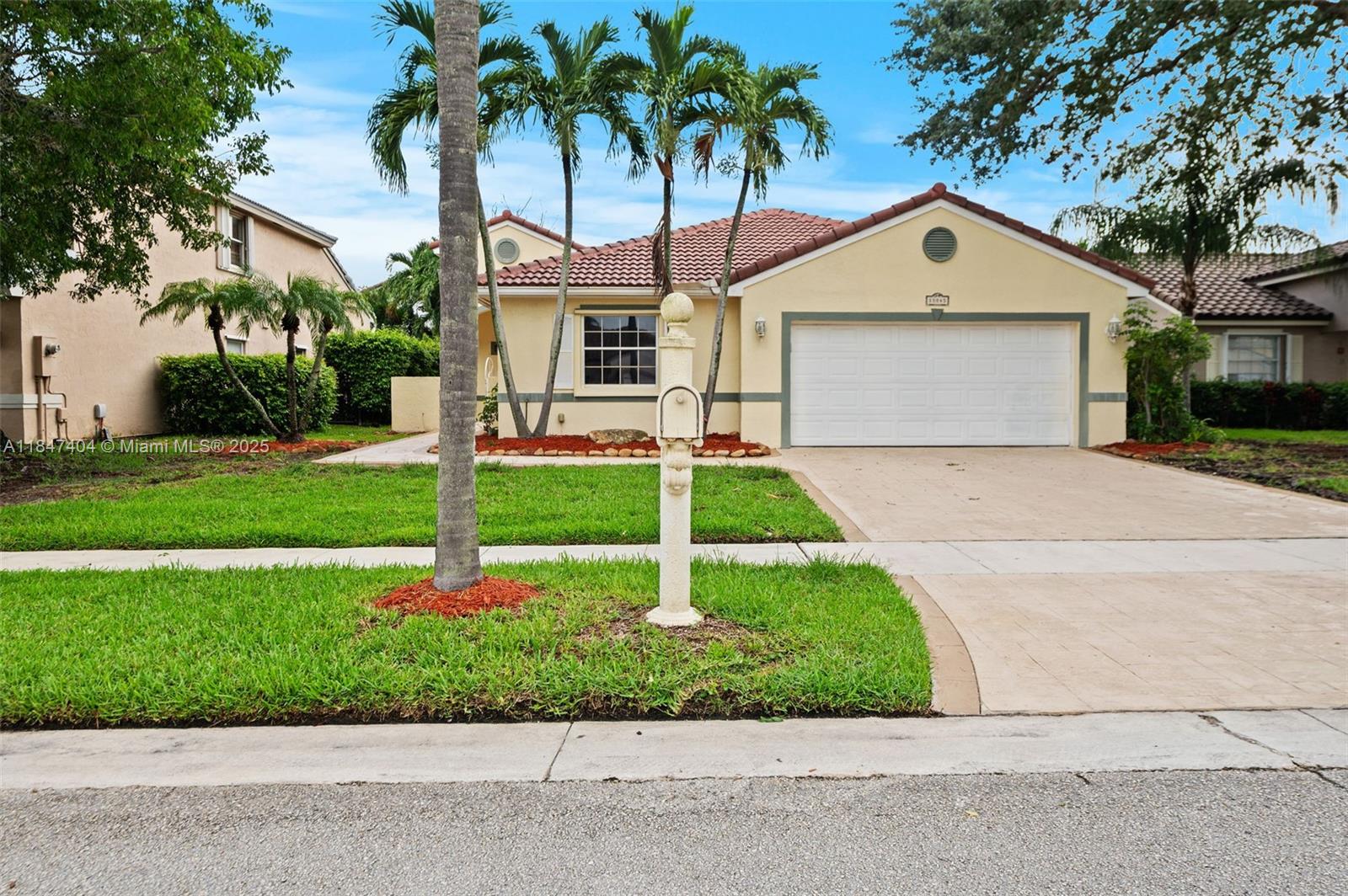 Charming One-Story Home in Chapel Trail – West Pembroke Pines- open-concept home in the sought-after Chapel Trail community,close to A-rated schools and the serene Rose Price Park.This light-filled home features a split floor plan for added privacy.The updated kitchen boasts granite countertops,a new dishwasher, & a cozy eat-in nook. The family room has wood floors,perfect for relaxing or entertaining.Enjoy the paver driveway and patio.Roof is just 2 years old.The garage has been converted to an A/C rec room and can easily be converted back.Bathrooms are renovated, the primary suite offering dual sinks & an upscale rainfall shower.Low HOA includes access to a tot lot,pool,clubhouse,& walking trails.Live in one of West Pines most exclusive neighborhoods—schedule your showing today!