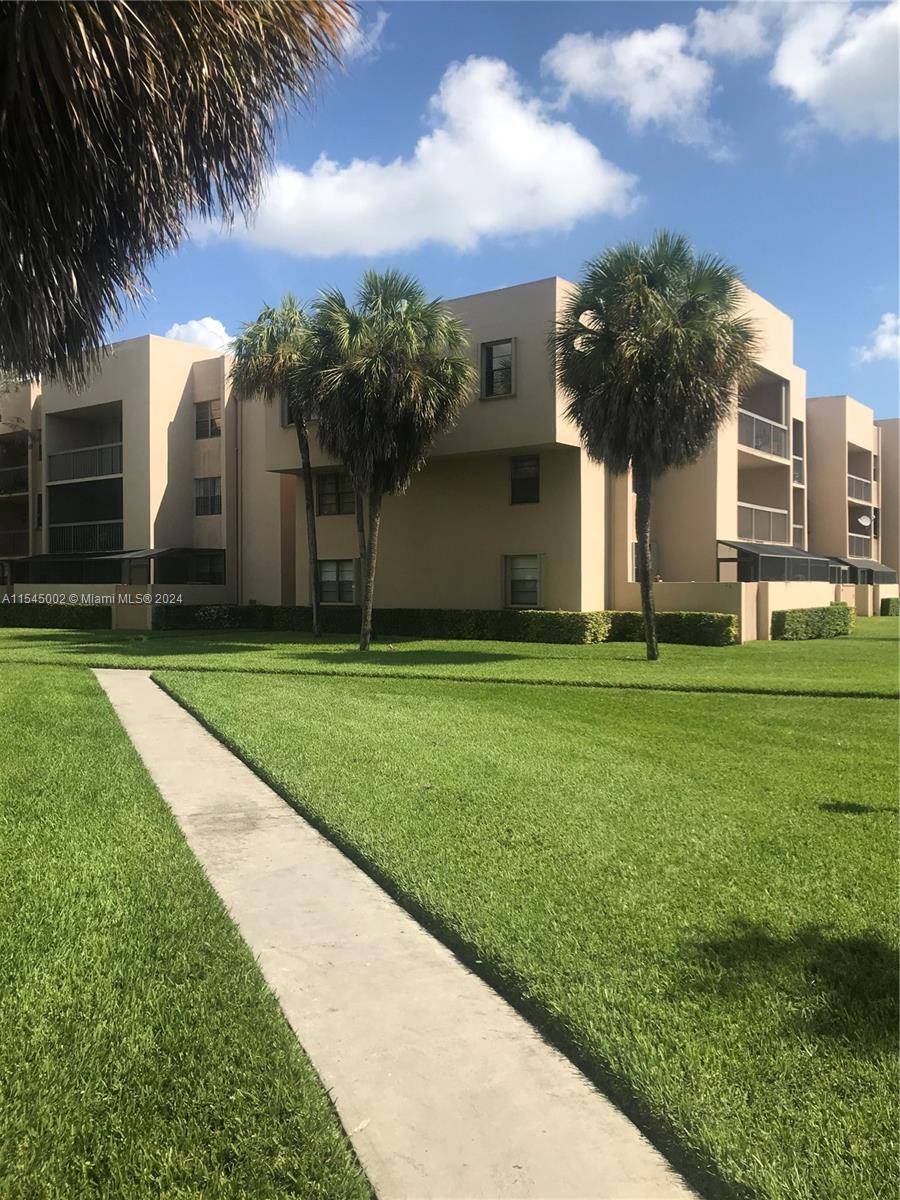 2 Bedroom 2 Bathroom , first floor corner unit at Gardens of Kendall. Beautiful garden view in a very tranquil location. Unit offers tiles throughout, updated kitchen with new appliances , covered screen patio and assigned parking space. The community offers a clubhouse , pool, tennis courts and more. Gardens of Kendall is located withing walking distance to Miami Dade College , steps away from public transportation, near Baptist and Jackson South Hospital, near Kendall Town and Country, minutes from Dadeland Mall and the Falls Shopping Center. Easy access to Shulas Expy and the Florida Turnpike. MUST SEE NO PETS