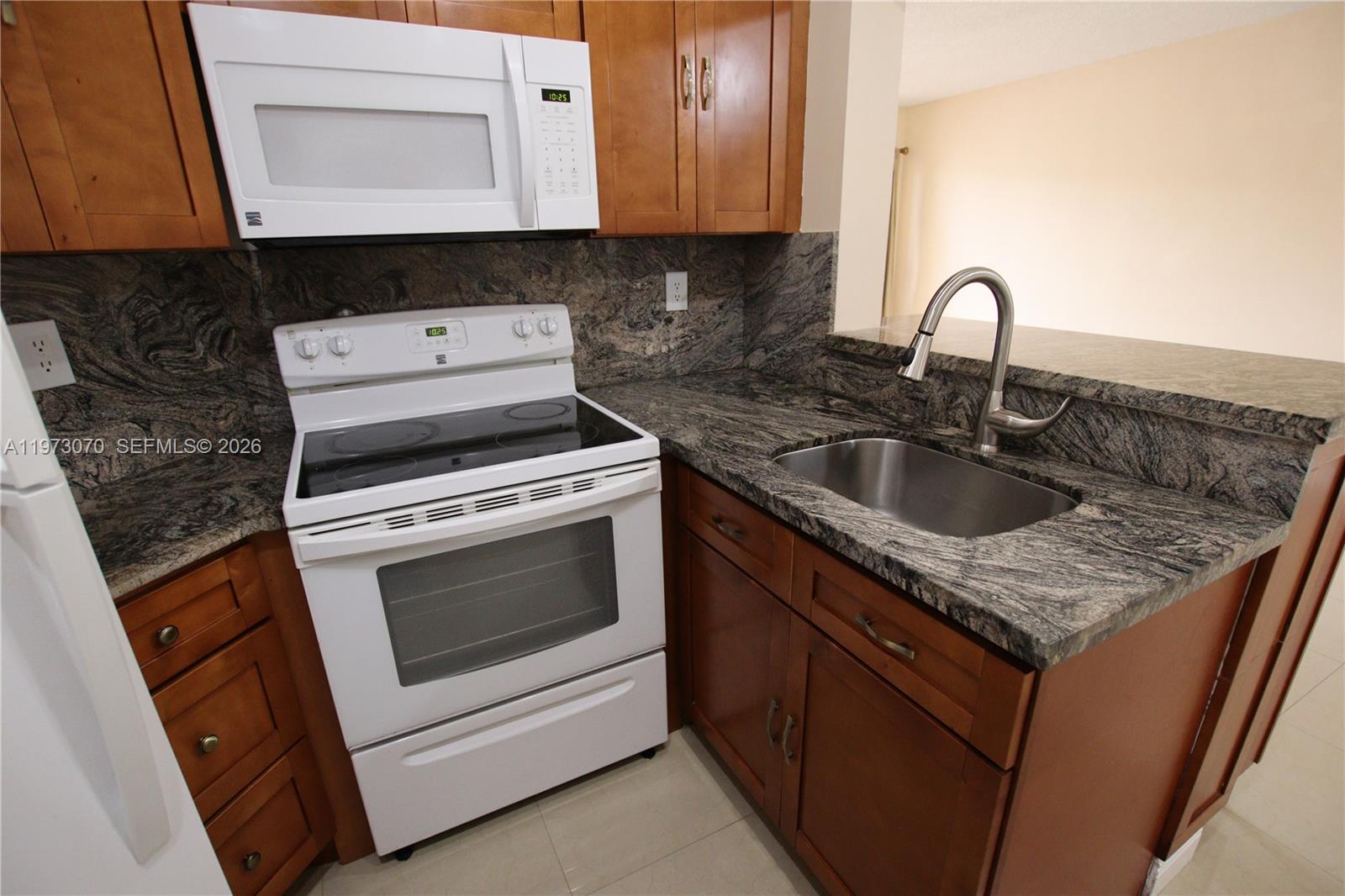 WEST GARDENS VILLAGE COND - Residential