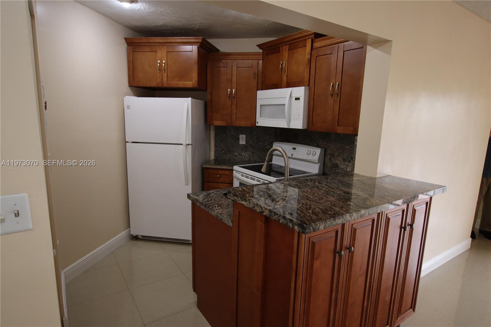 WEST GARDENS VILLAGE COND - Residential