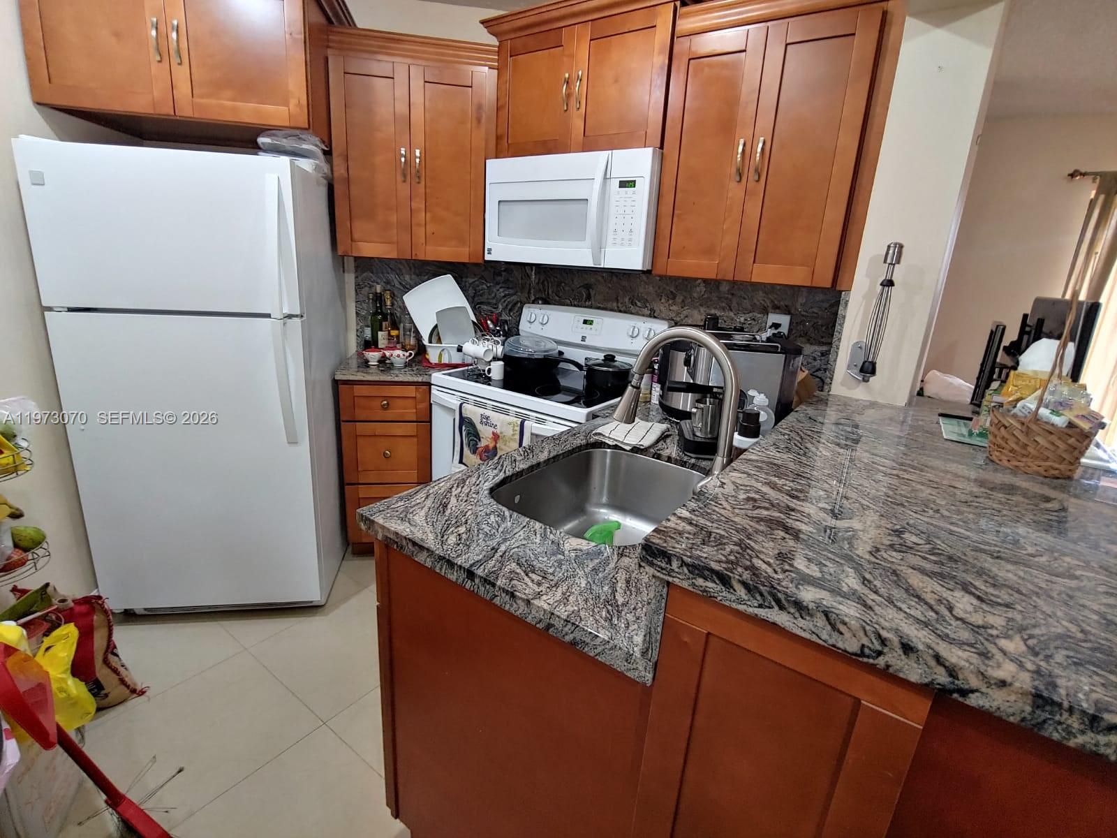 WEST GARDENS VILLAGE COND - Residential