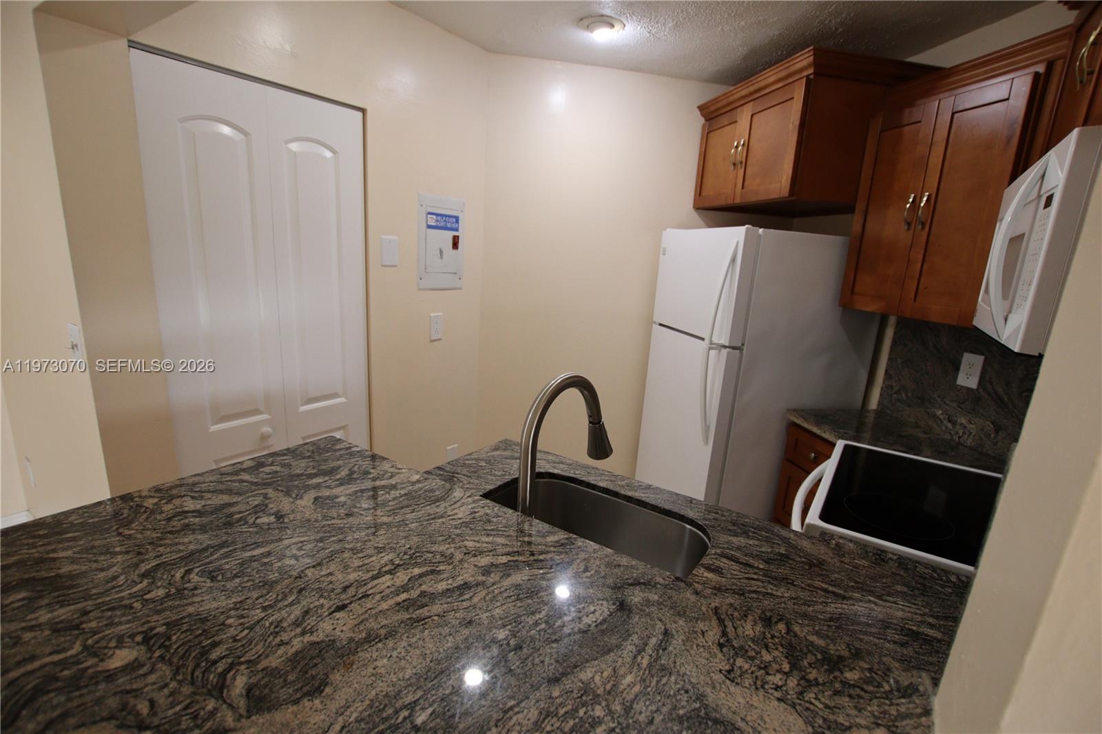 WEST GARDENS VILLAGE COND - Residential