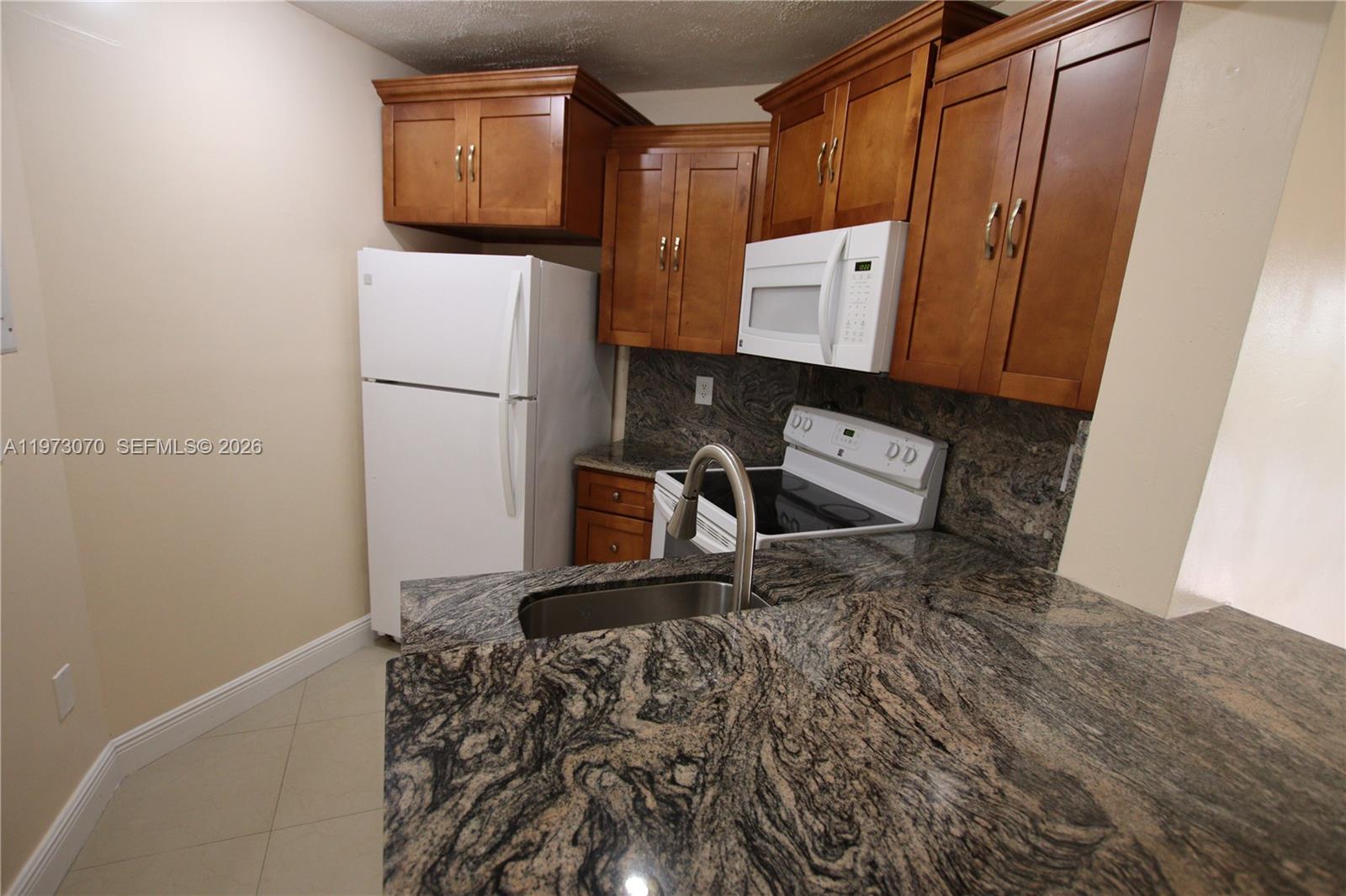 WEST GARDENS VILLAGE COND - Residential