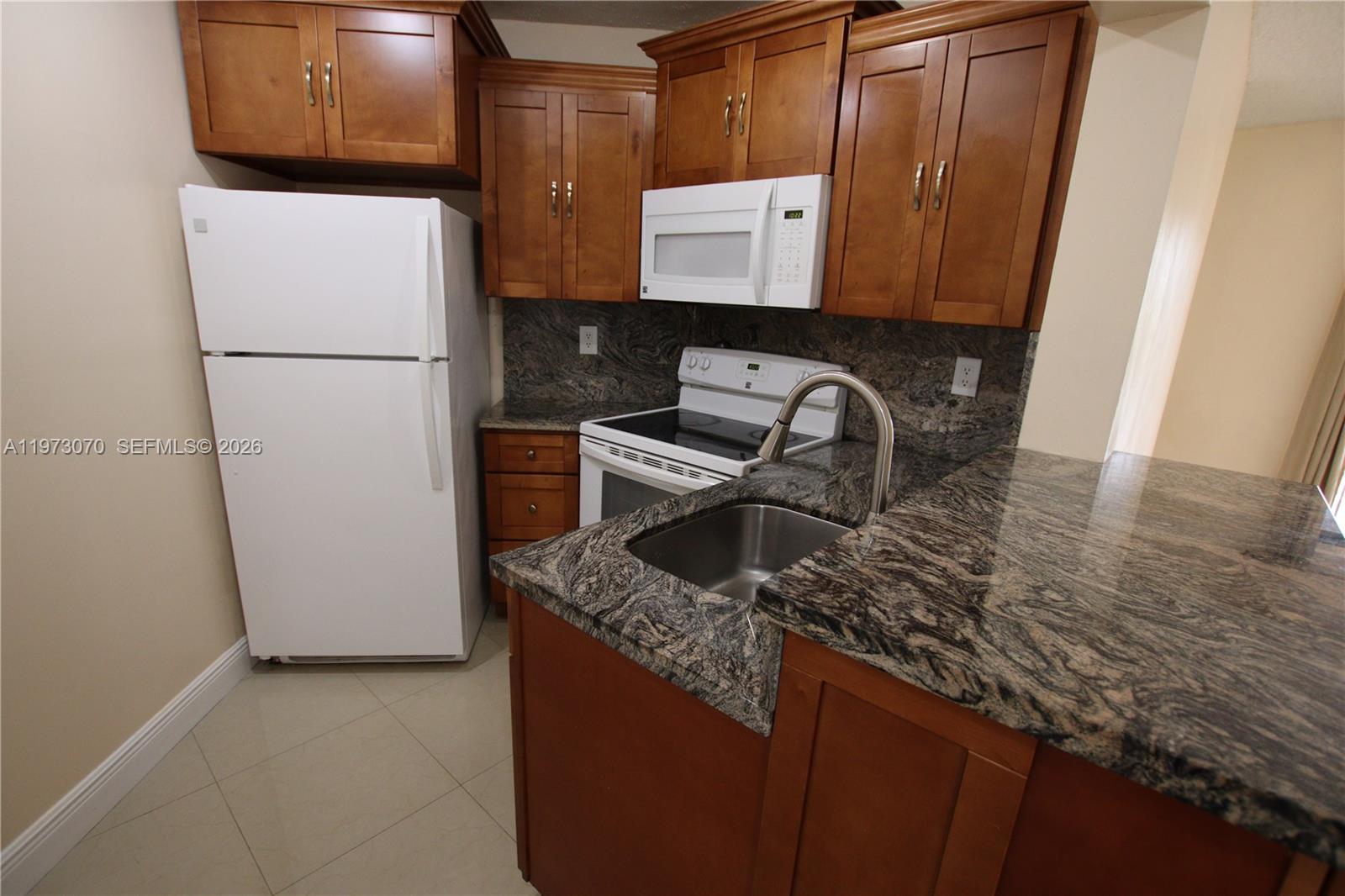 WEST GARDENS VILLAGE COND - Residential