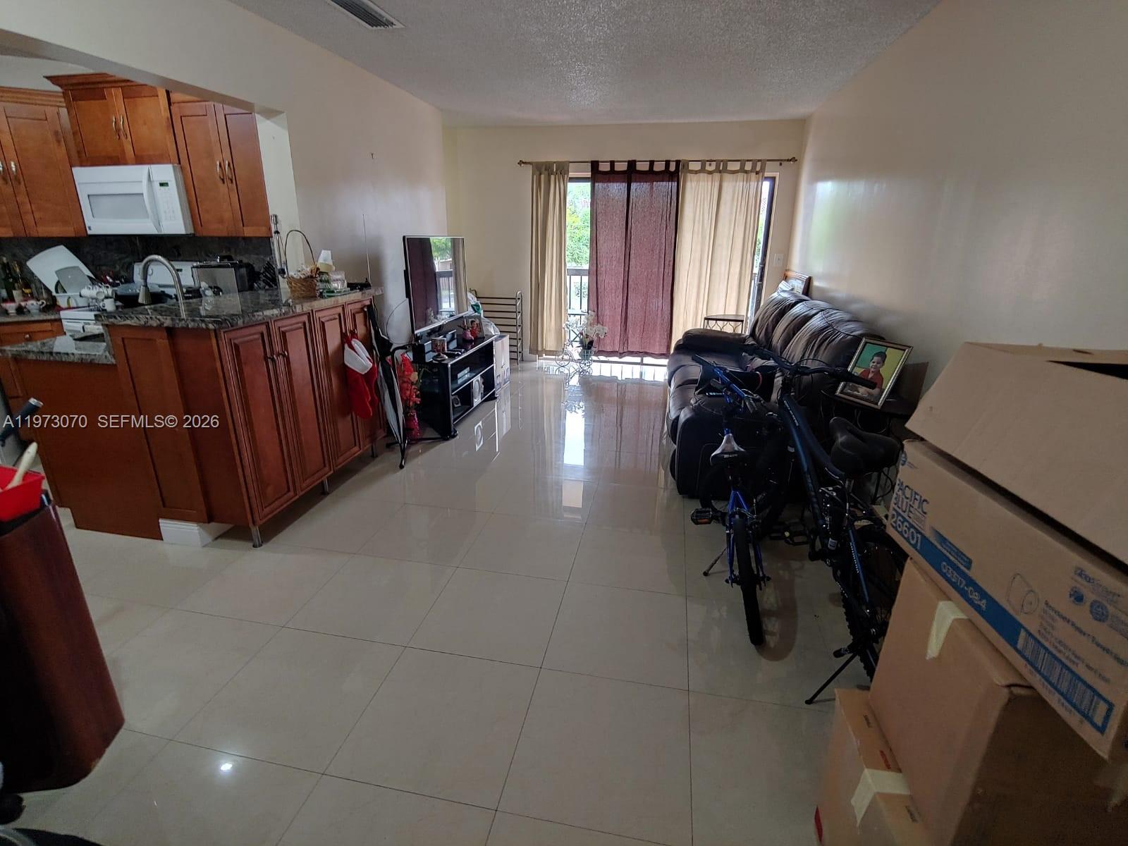 WEST GARDENS VILLAGE COND - Residential