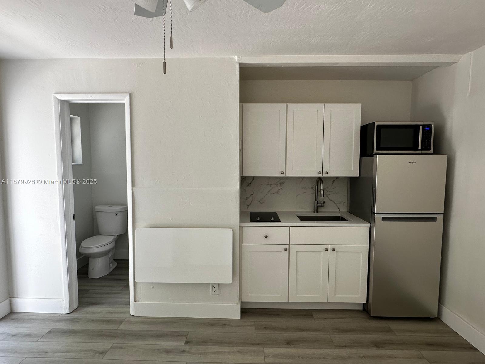 Cozy studio with kitchen (refrigerator, cooktop, microwave oven). Full bathroom w/shower. Wall A/C unit. Driveway with one assigned parking space. Quiet neighborhood, conveniently located one block from US-1 & Sheridan. Rent includes all utilities (electricity, water, sewer, garbage removal). Available Oct 1st. Fast approval. Tenant occupied until September 30th. First, last and one month security deposit.