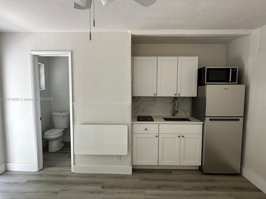 Cozy studio with kitchen (refrigerator, cooktop, microwave oven). Full bathroom w/shower. Wall A/C unit. Driveway with one assigned parking space. Quiet neighborhood, conveniently located one block from US-1 & Sheridan. Rent includes all utilities (electricity, water, sewer, garbage removal). Available Oct 1st. Fast approval. Tenant occupied until September 30th. First, last and one month security deposit. No showings until tenant has left.