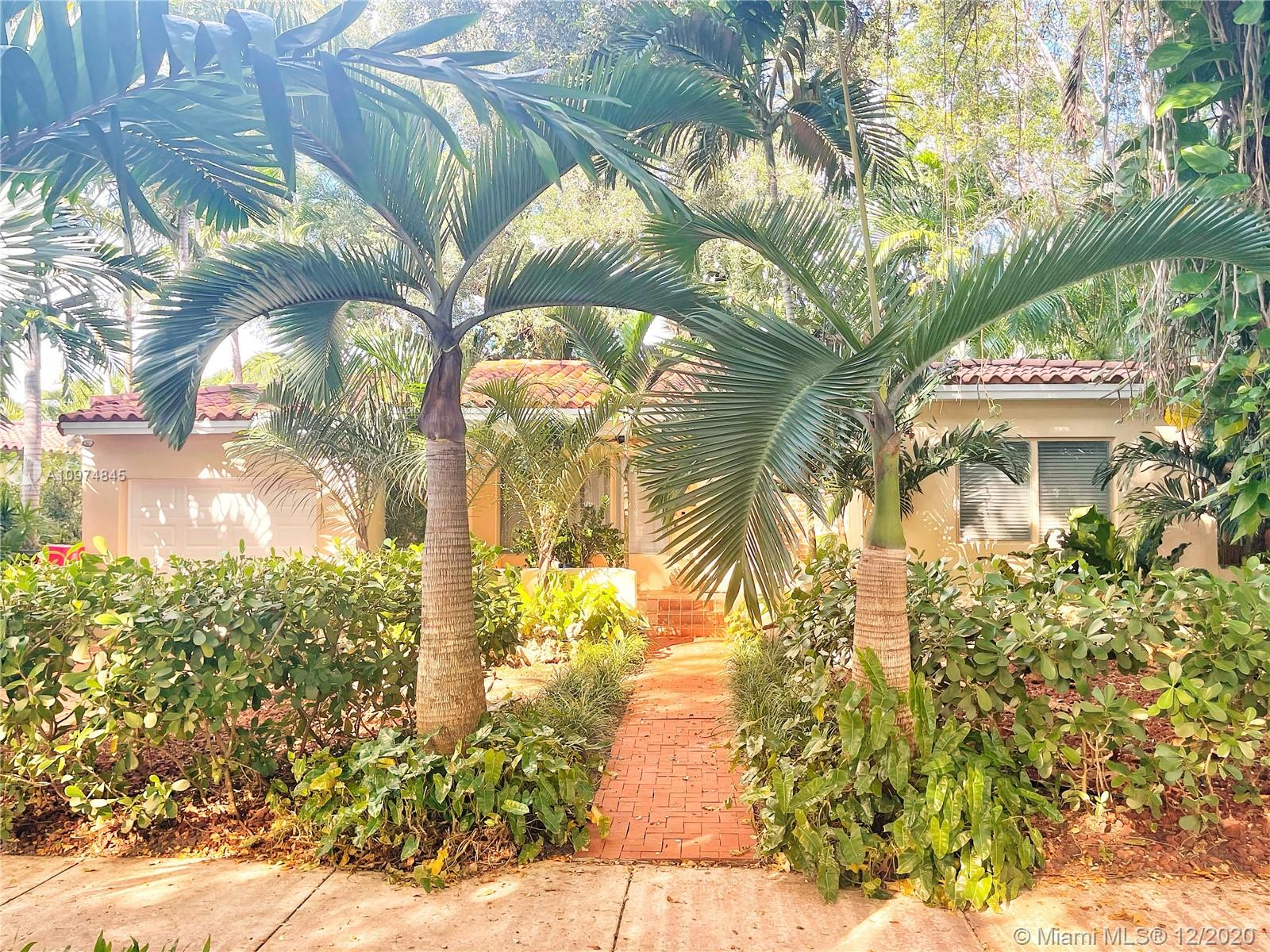 Exclusive south coral gables home, on quiet street in desirable Riviera neighborhood. This classic Spanish styled home has Large 2BD/2BR, large dining and living areas with massive a 800sqf sunny family room. Each bedroom has its own on-suite, brand new bathrooms rooms. Pine wood floors and original Cuban tiles in dining room. New eat in gourmet kitchen with Carrara marble tabletop island. Massive and sunny Family room overlooking the tropical garden, centuries old oak tree, hot tub, and BBQ area. Fenced in and private with wrap around bamboo fencing. Functional one car garage, washer dryer and new on-demand hot water heater. Monthly yard service is included. Minutes to cocoplum or downtown coral gables. You can walk to coconut grove, the Metrorail or even Merrick Village Shopping Center.